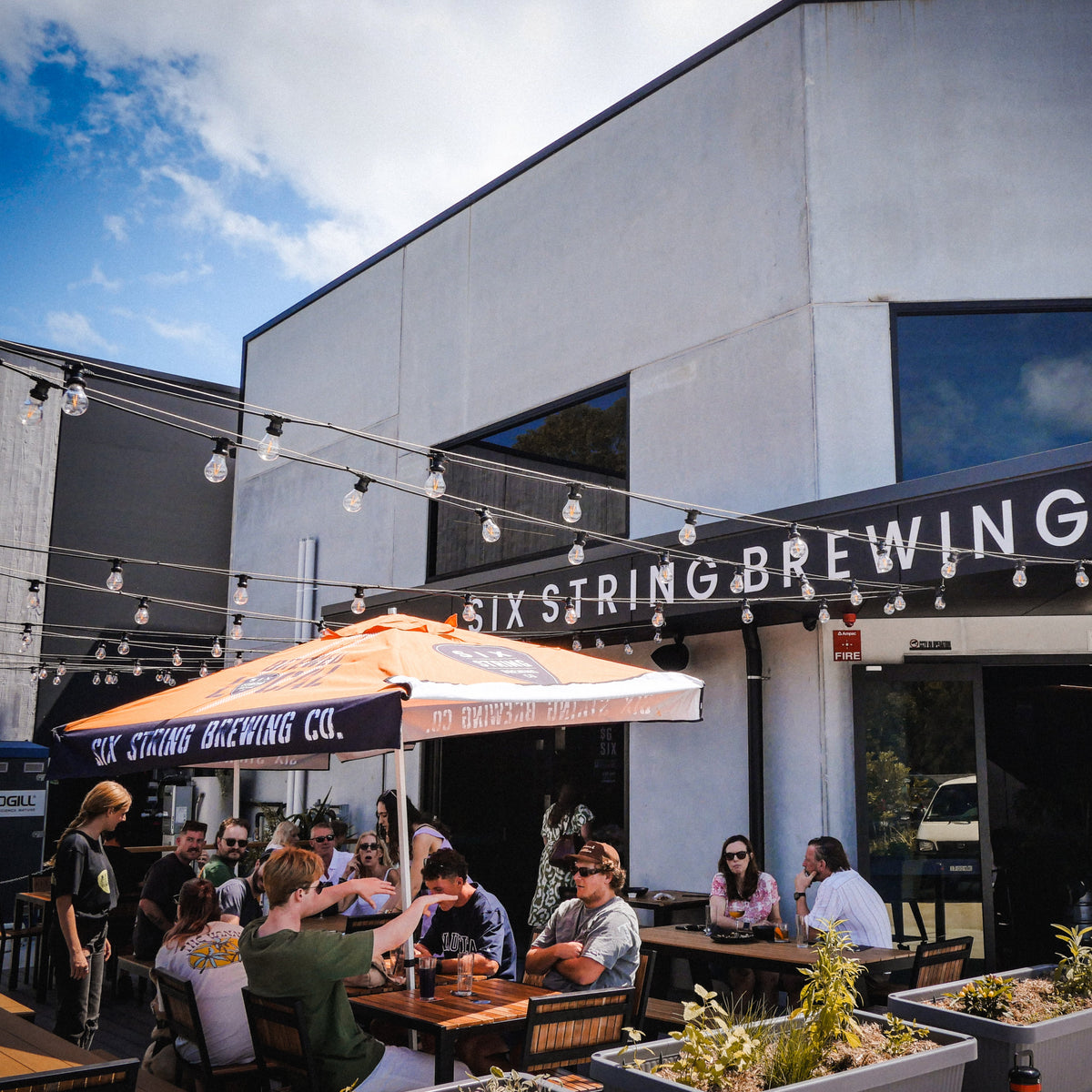 The real taproom and brewery interior at Six String Brewing's Erina venue